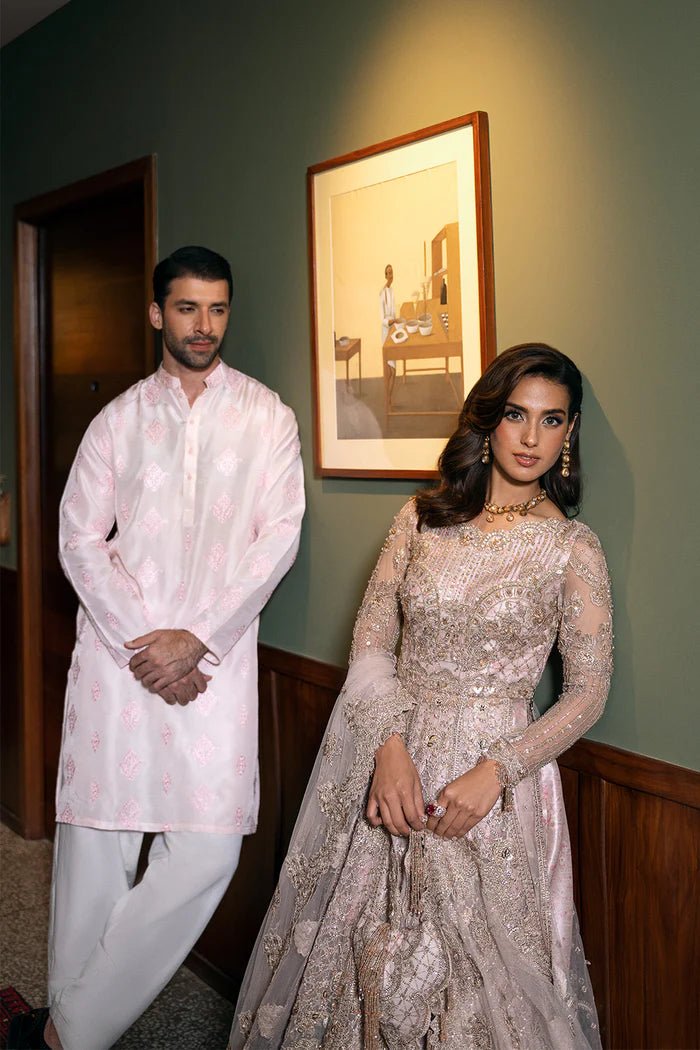 Model wearing RIGEL - SRF - D - 03 from Saira Rizwan's Festive Unstitched collection in vibrant red. Luxury pret, festive, Pakistani clothes online in UK.