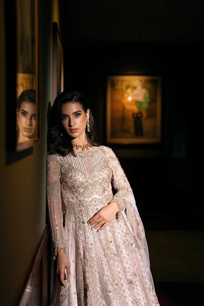 Model wearing RIGEL - SRF - D - 03 from Saira Rizwan's Festive Unstitched collection in vibrant red. Luxury pret, festive, Pakistani clothes online in UK.