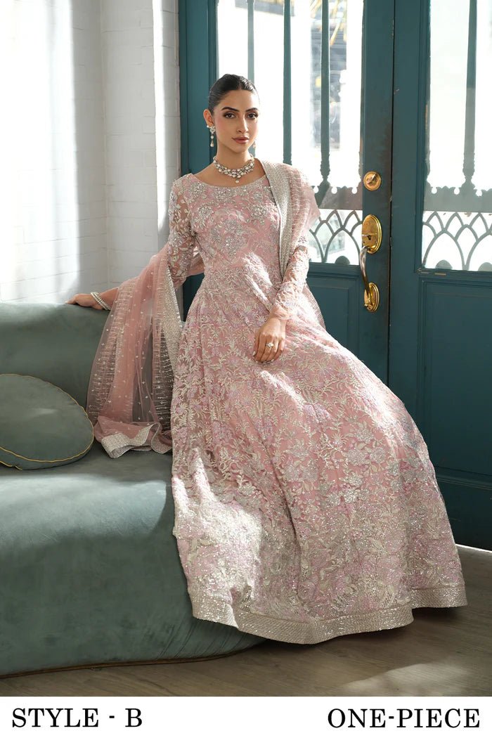 Model wearing a light pink lehenga choli from Saira Rizwan's Naqsh Festive '24 collection, SRN24 - 03 FRANCESCA. Perfect for weddings, this dress is available at Signature Labels Pakistani clothes online in UK.