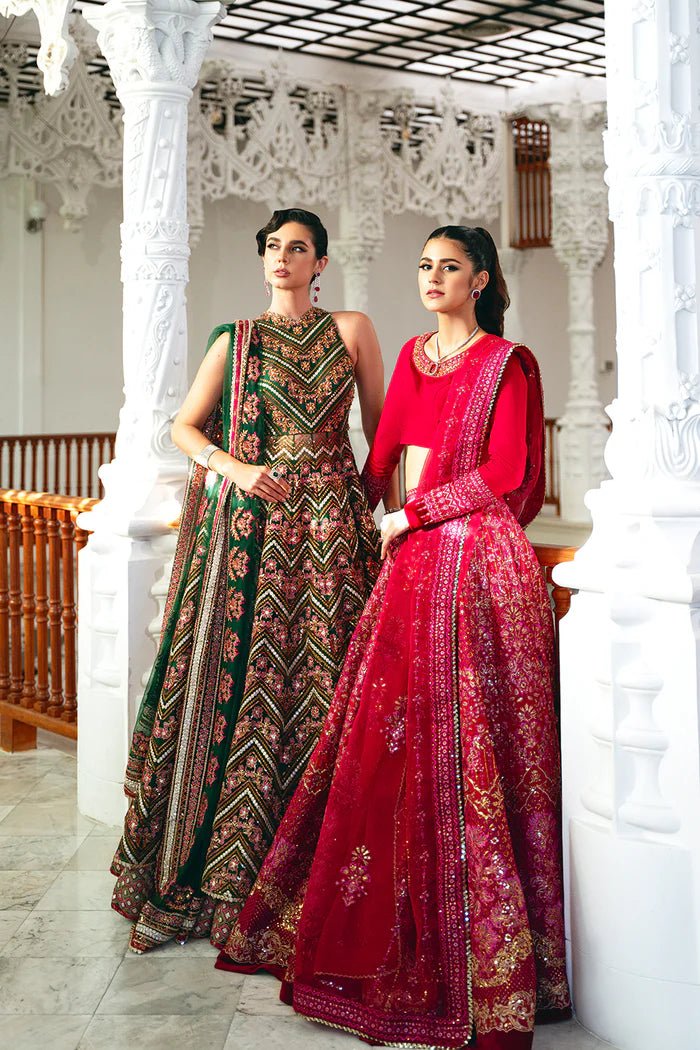 Model wearing a red SRN24 - 04 SHARMAS lehenga choli from Saira Rizwan's Naqsh Festive '24 collection. Available online in the UK, perfect for weddings.