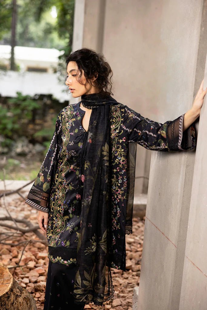 Model wearing black floral embroidered Design 2B from Sobia Nazir's Fall Edit '24 collection. Pakistani winter clothes, casual pret available online in the UK.