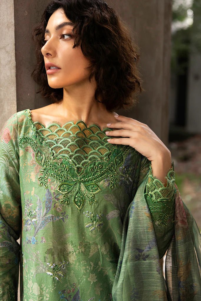 Model wearing green floral embroidered Design 3A from Sobia Nazir's Fall Edit '24 collection. Pakistani winter clothes, casual pret available online in the UK.
