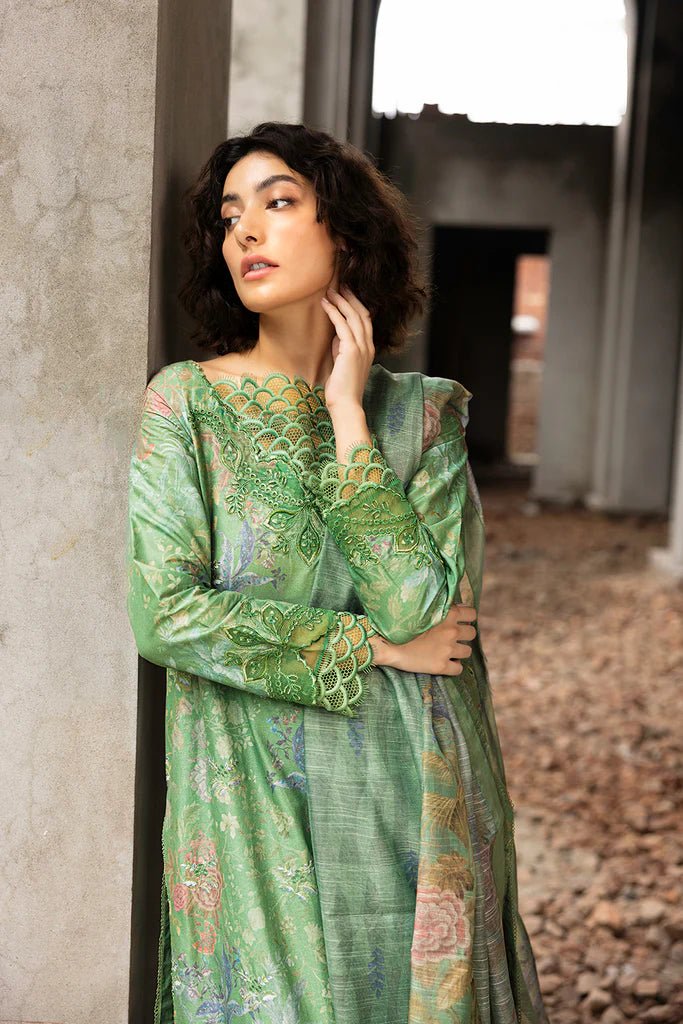 Model wearing green floral embroidered Design 3A from Sobia Nazir's Fall Edit '24 collection. Pakistani winter clothes, casual pret available online in the UK.