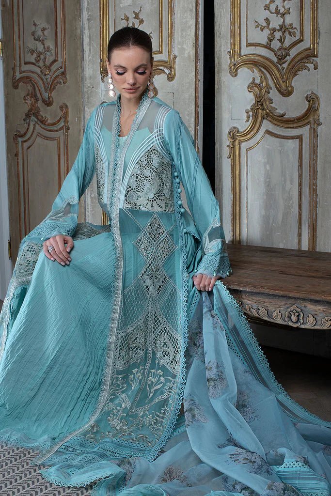 Model in Sobia Nazir DESIGN 10A, an exquisite blue Pakistani lawn dress for the UK.