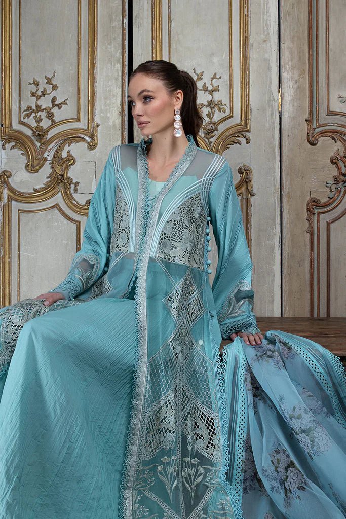 Model in Sobia Nazir DESIGN 10A, an exquisite blue Pakistani lawn dress for the UK.