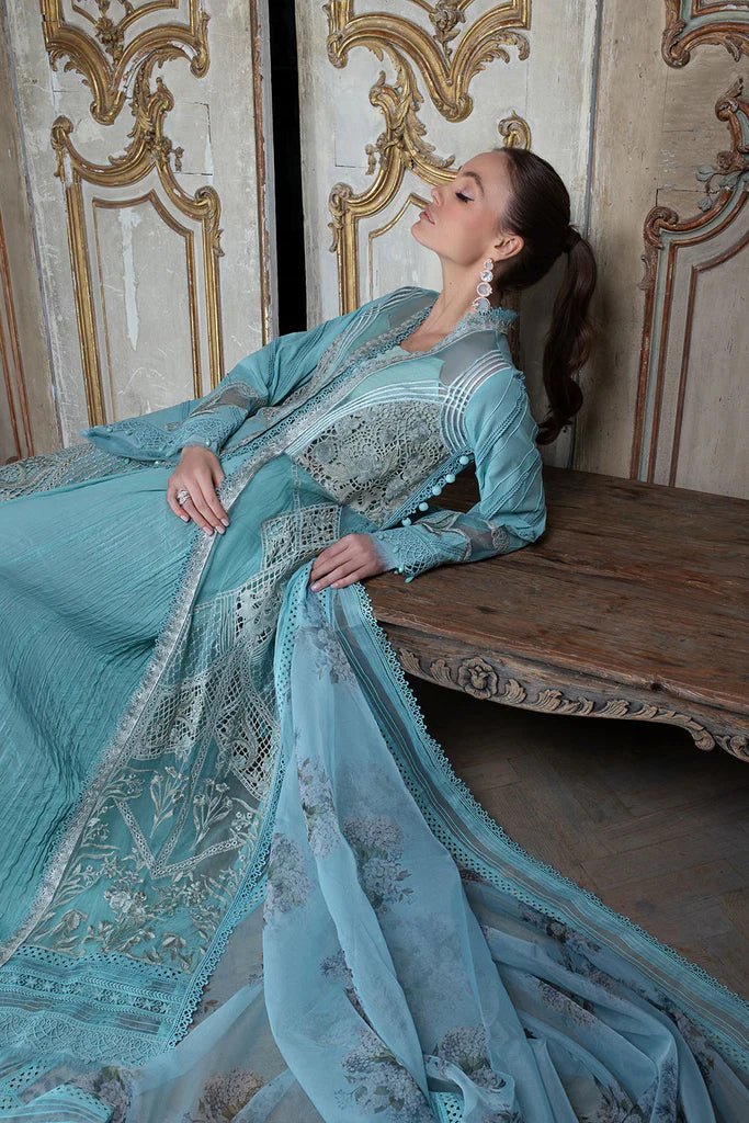 Model in Sobia Nazir DESIGN 10A, an exquisite blue Pakistani lawn dress for the UK.