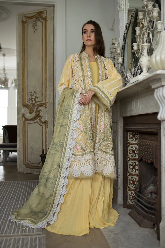 Model in Sobia Nazir DESIGN 11A, yellow luxury Pakistani lawn suit, perfect for UK fashionistas.
