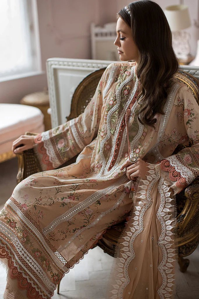 Model contemplates in a Sobia Nazir DESIGN 14B, showcasing Pakistani craftsmanship in the UK.
