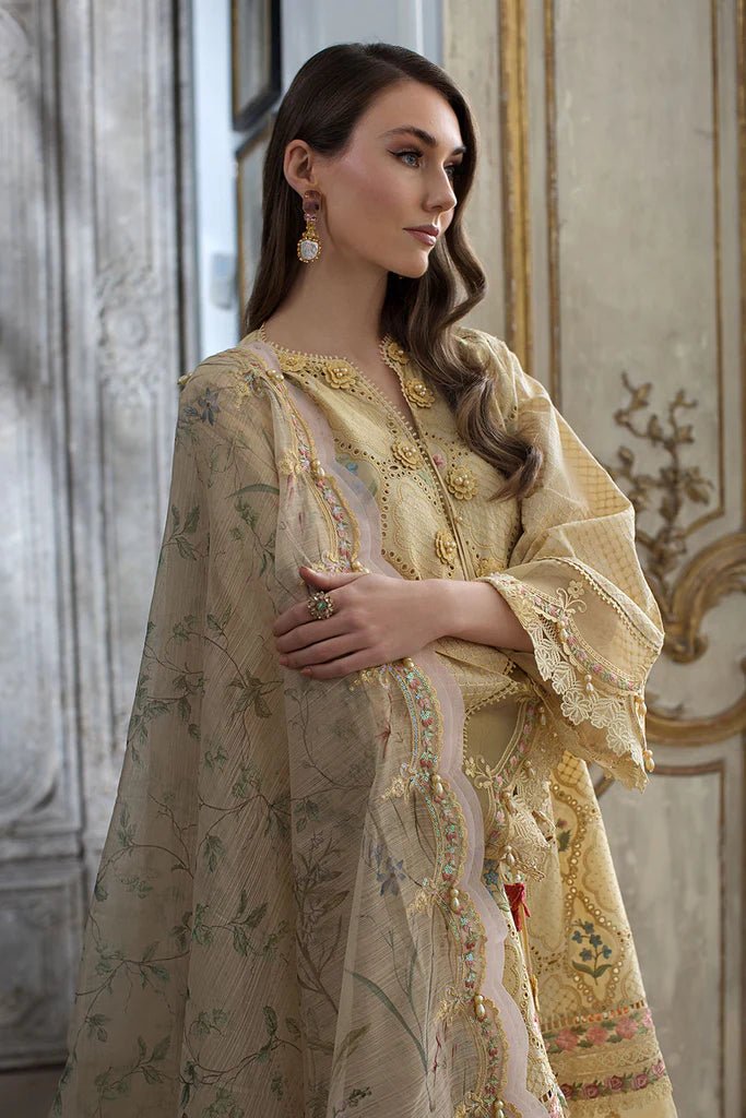 Model in elegant Sobia Nazir DESIGN 2B, a luxurious Pakistani lawn dress, UK collection.