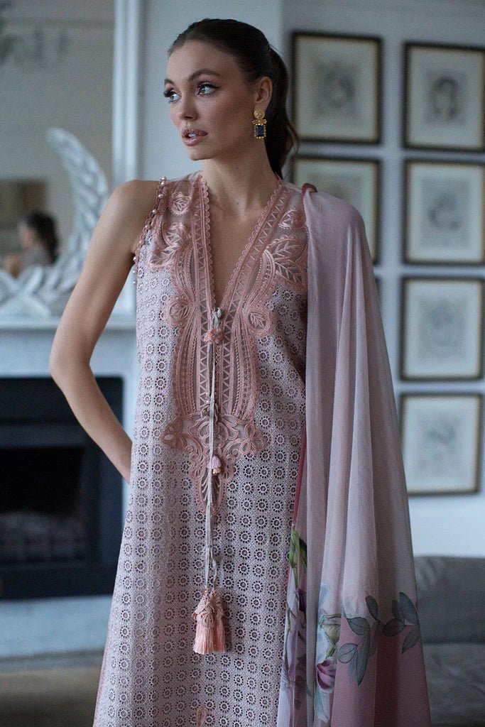 Model in Sobia Nazir DESIGN 5B, a pastel Pakistani lawn suit, UK's latest trend.