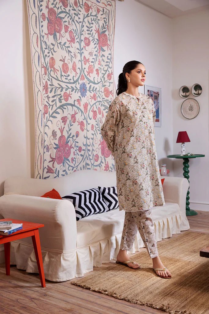 Model wearing Design 1A dress from Sobia Nazir's SN Basics '24 Unstitched collection. Shop Sobia Nazir and Pakistani clothes online in UK at Signature Labels.