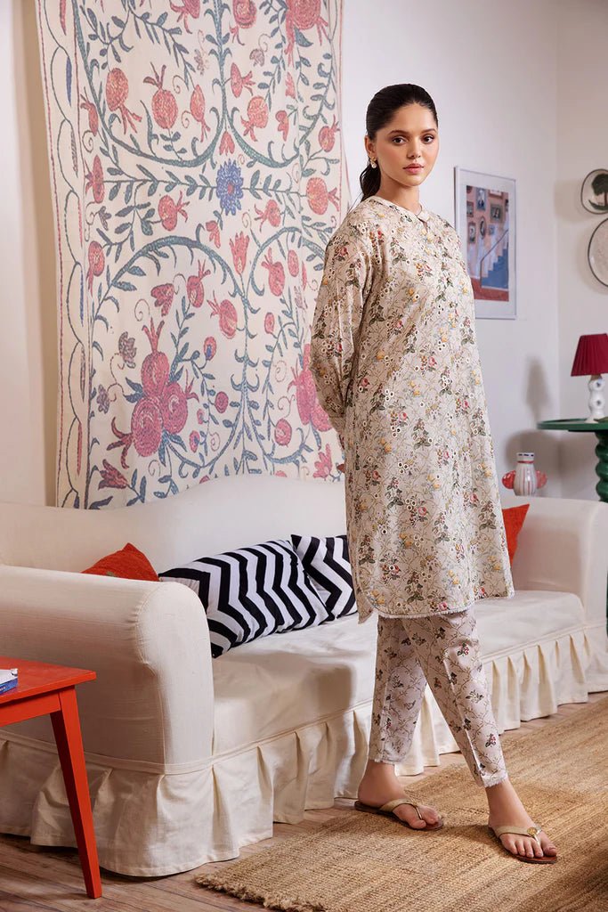 Model wearing Design 1A dress from Sobia Nazir's SN Basics '24 Unstitched collection. Shop Sobia Nazir and Pakistani clothes online in UK at Signature Labels.