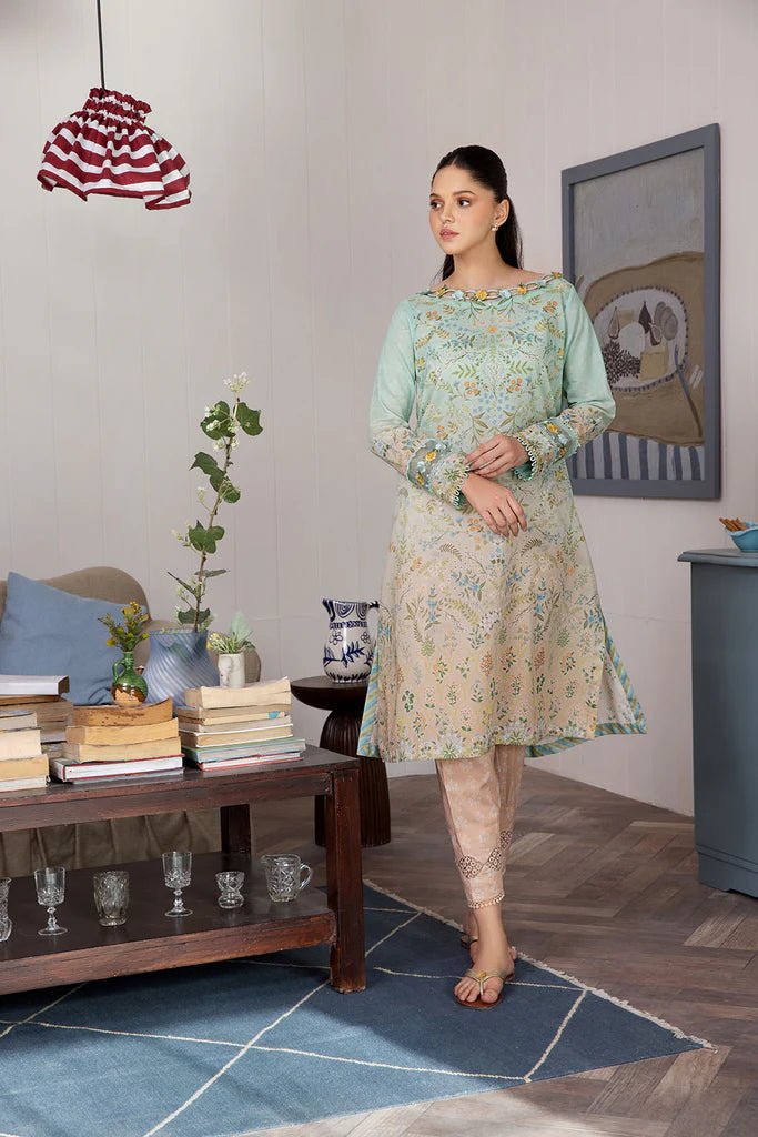 Model wearing Design 2B dress from Sobia Nazir's SN Basics '24 Unstitched collection. Shop Sobia Nazir and Pakistani clothes online in UK at Signature Labels.