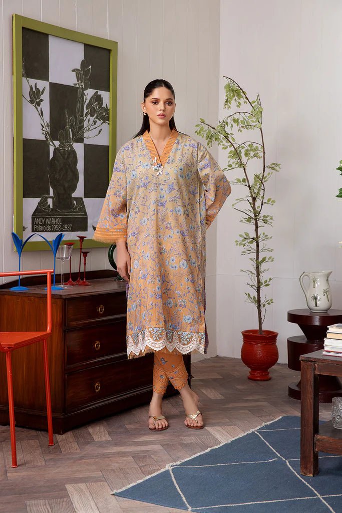 Model wearing Design 4A dress from Sobia Nazir's SN Basics '24 Unstitched collection. Shop Sobia Nazir and Pakistani clothes online in UK at Signature Labels.