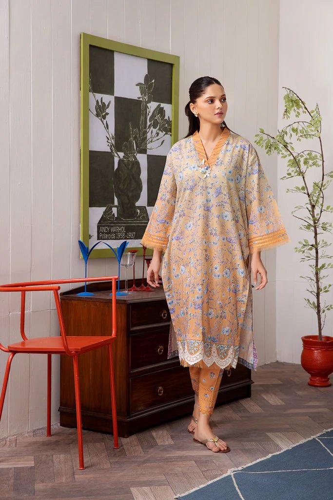 Model wearing Design 4A dress from Sobia Nazir's SN Basics '24 Unstitched collection. Shop Sobia Nazir and Pakistani clothes online in UK at Signature Labels.