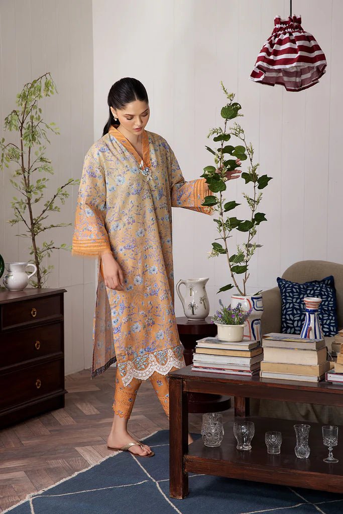 Model wearing Design 4A dress from Sobia Nazir's SN Basics '24 Unstitched collection. Shop Sobia Nazir and Pakistani clothes online in UK at Signature Labels.