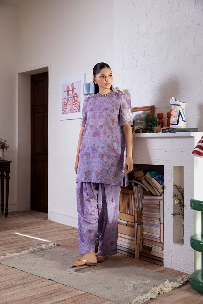 Model wearing Design 6B dress from Sobia Nazir's SN Basics '24 Unstitched collection. Shop Sobia Nazir for Pakistani clothes online in UK.