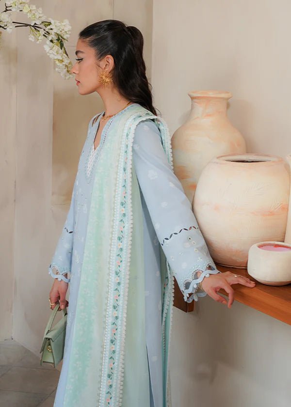 Model wearing Suffuse Luna dress, a summer essential for Pakistani clothes online in UK. Effortlessly stylish and chic.