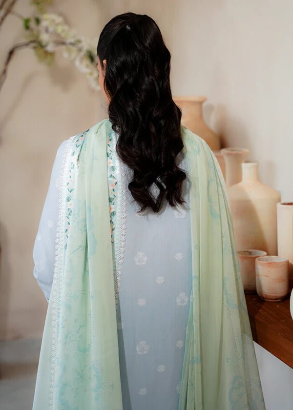 Model wearing Suffuse Luna dress, a summer essential for Pakistani clothes online in UK. Effortlessly stylish and chic.