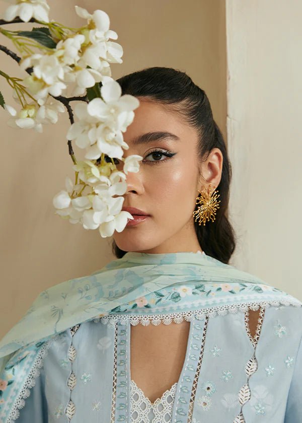 Model wearing Suffuse Luna dress, a summer essential for Pakistani clothes online in UK. Effortlessly stylish and chic.