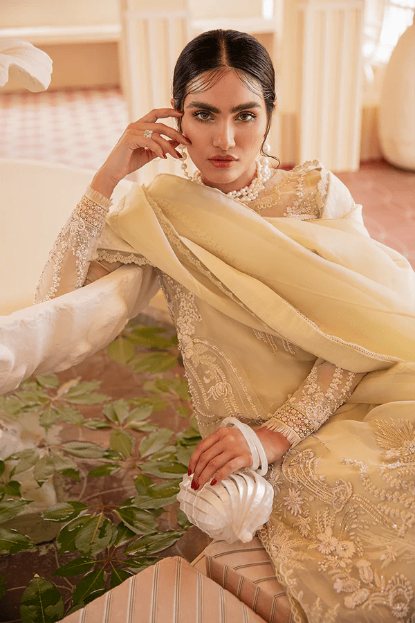 Model wearing Suffuse Chartreuse dress, a luxurious pick from Luxury Pret '23 collection. Perfect for Pakistani clothes online in UK.