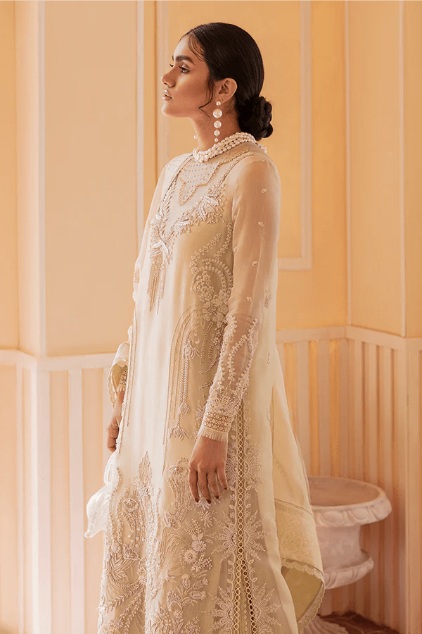 Model wearing Suffuse Chartreuse dress, a luxurious pick from Luxury Pret '23 collection. Perfect for Pakistani clothes online in UK.