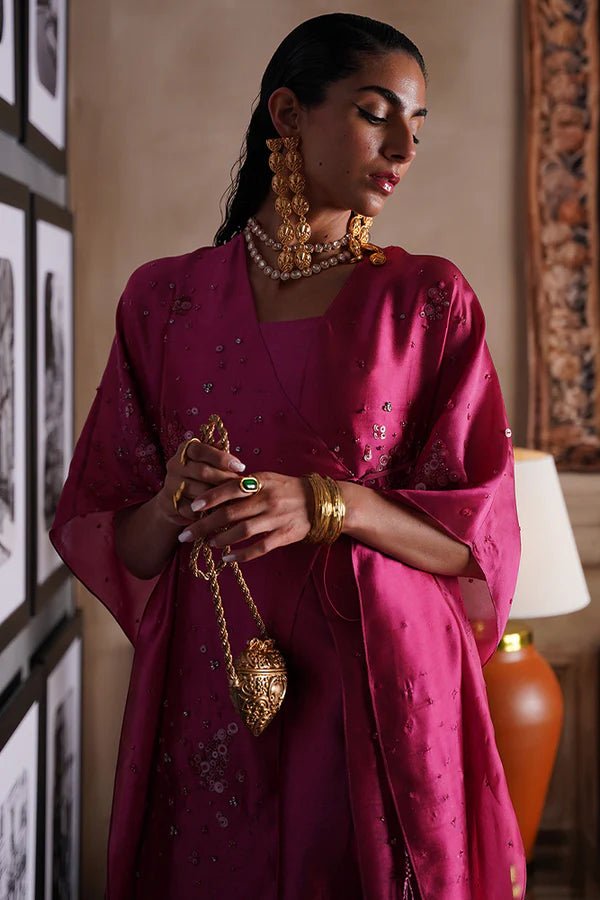 Model showcasing Suffuse ILSA attire, a stunning piece from Luxury Pret '24 collection. Pakistani fashion online in UK.