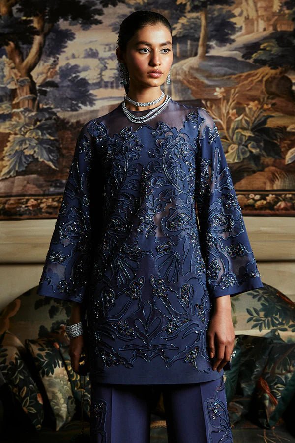 Model in Suffuse's IRINA dress, a luxurious ensemble from the Luxury Pret '24 line. Pakistani attire online UK.