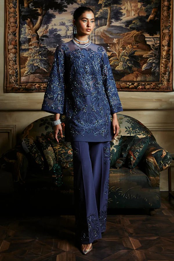 Model in Suffuse's IRINA dress, a luxurious ensemble from the Luxury Pret '24 line. Pakistani attire online UK.