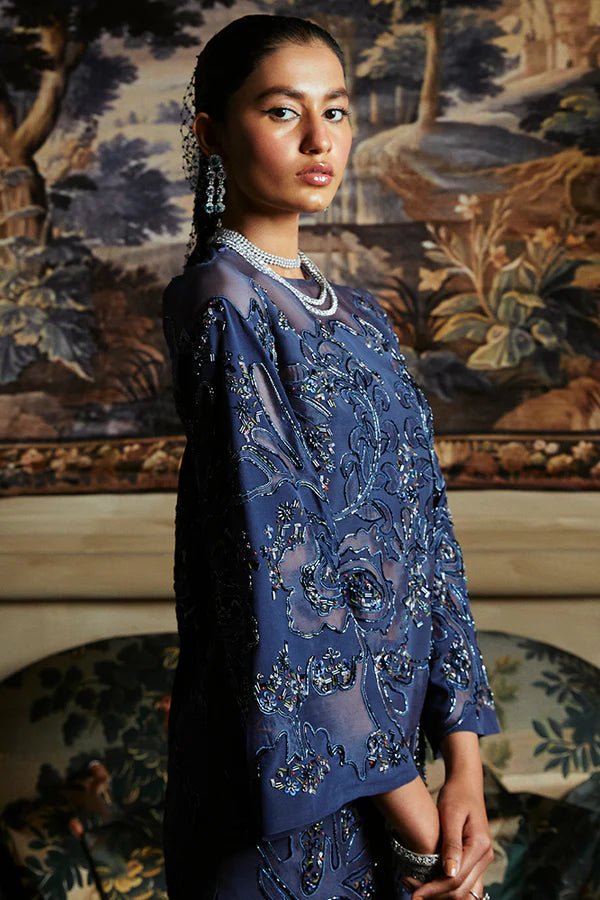Model in Suffuse's IRINA dress, a luxurious ensemble from the Luxury Pret '24 line. Pakistani attire online UK.