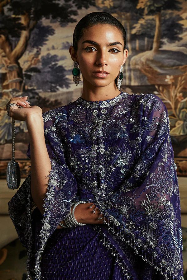 Model wearing Suffuse's MAEVE dress, a stunning addition to the Luxury Pret '24 collection. Shop Pakistani clothes online in UK.