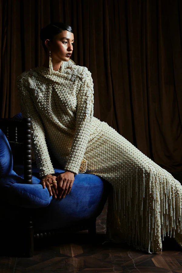 Model wearing Suffuse OPAL dress, a chic ensemble from Luxury Pret '24. Pakistani couture online in UK.