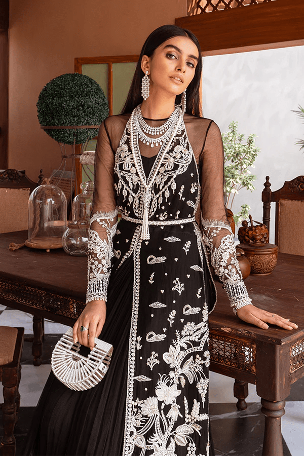 Model showcasing Suffuse Tahitian Pearl dress, a luxurious pick from Luxury Pret Aura collection. Ideal for Pakistani wedding clothes online in UK.