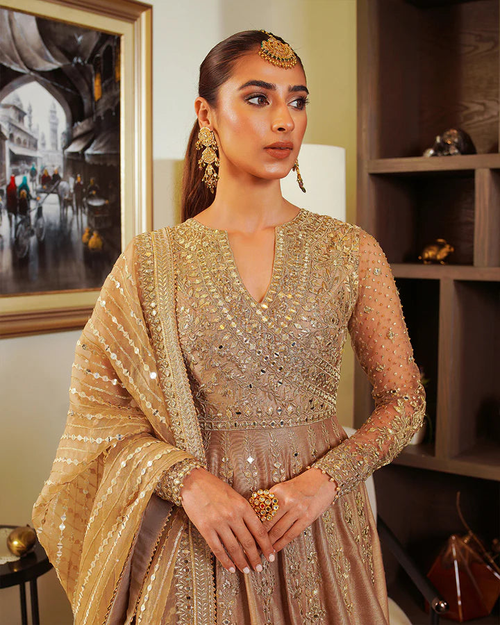 Model wearing beige and multicolor dress Sulata by Faiza Saqlain, Pakistani luxury pret, available online in UK