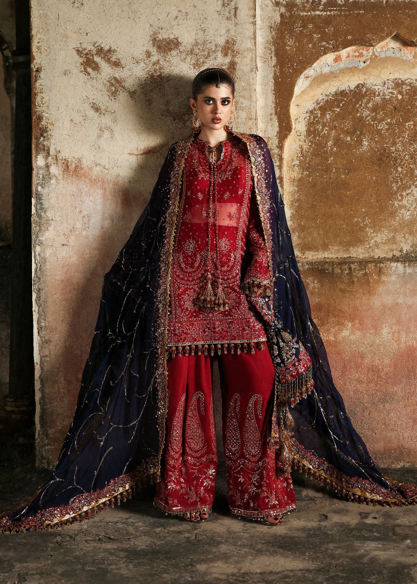 Model wearing Shahrbano by Hussain Rehar in deep red with navy dupatta – Pakistani luxury pret, shop Hussain Rehar clothes online in UK.