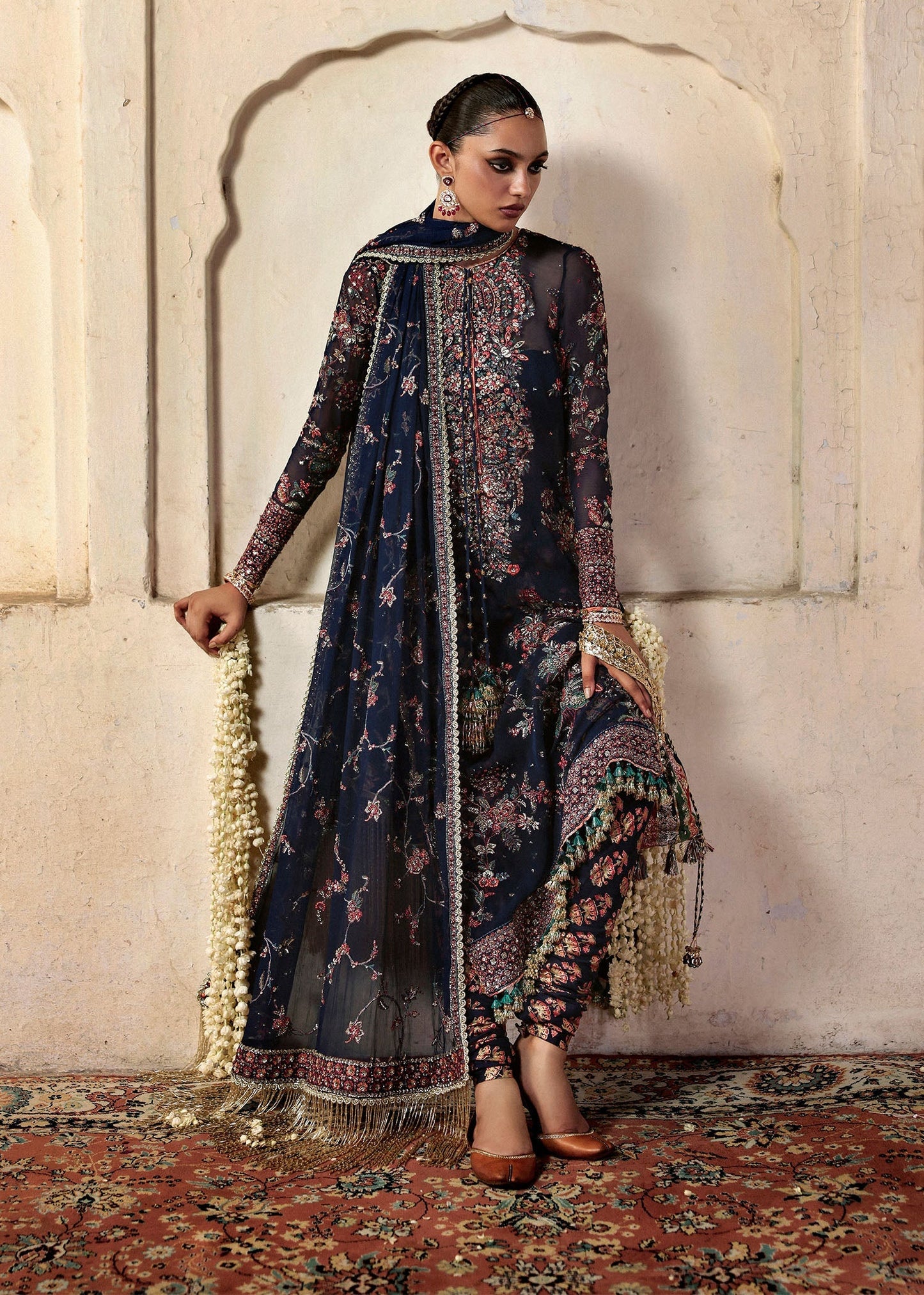 Model wearing Rabab by Hussain Rehar in navy blue floral – Pakistani luxury pret, shop Hussain Rehar clothes online in UK for festive wear.