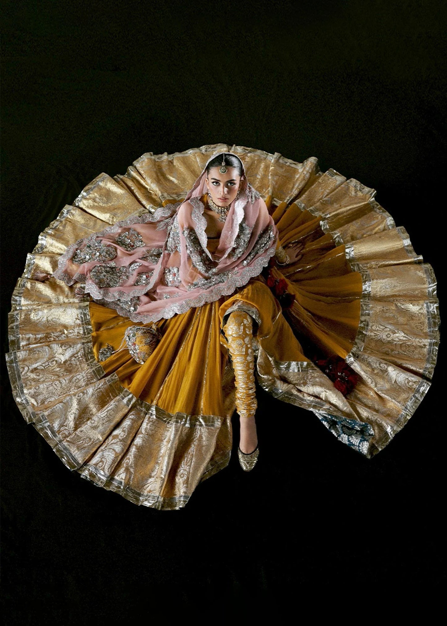 Model wearing Elika by Hussain Rehar in mustard and pink with heavy silver embellishments – exquisite Pakistani luxury pret outfit in UK.
