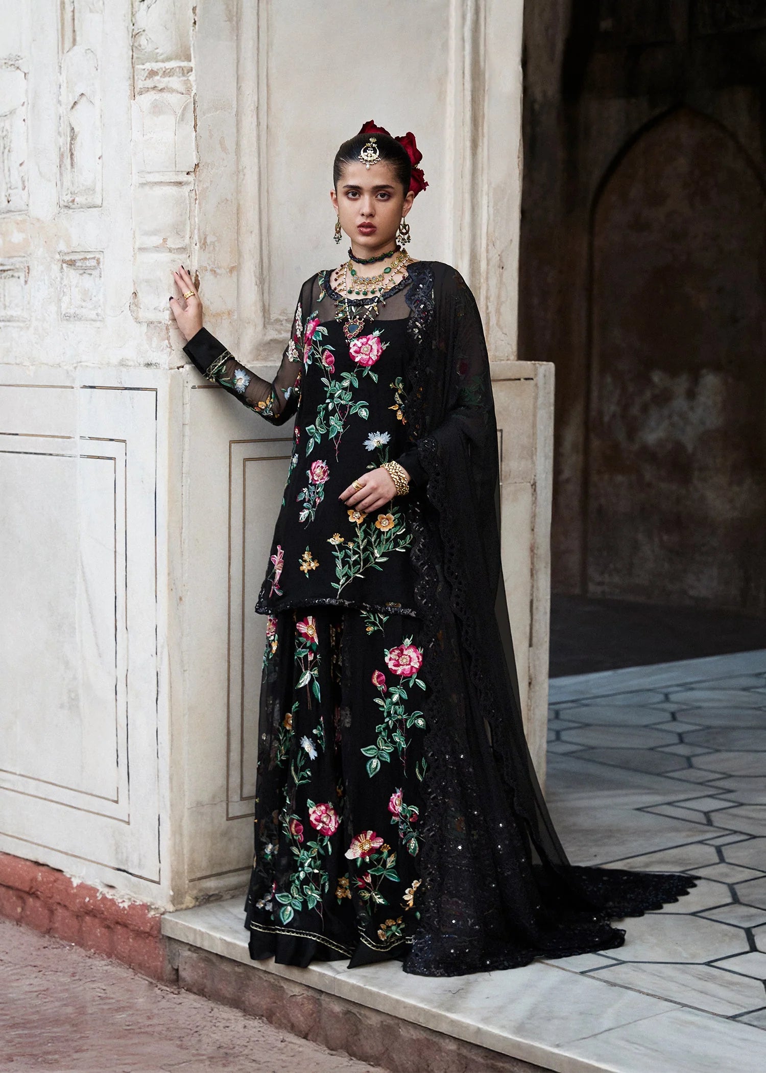 Model wearing Deraya by Hussain Rehar in black floral embroidered outfit – Pakistani luxury pret ideal for festive wear, shop online in UK.