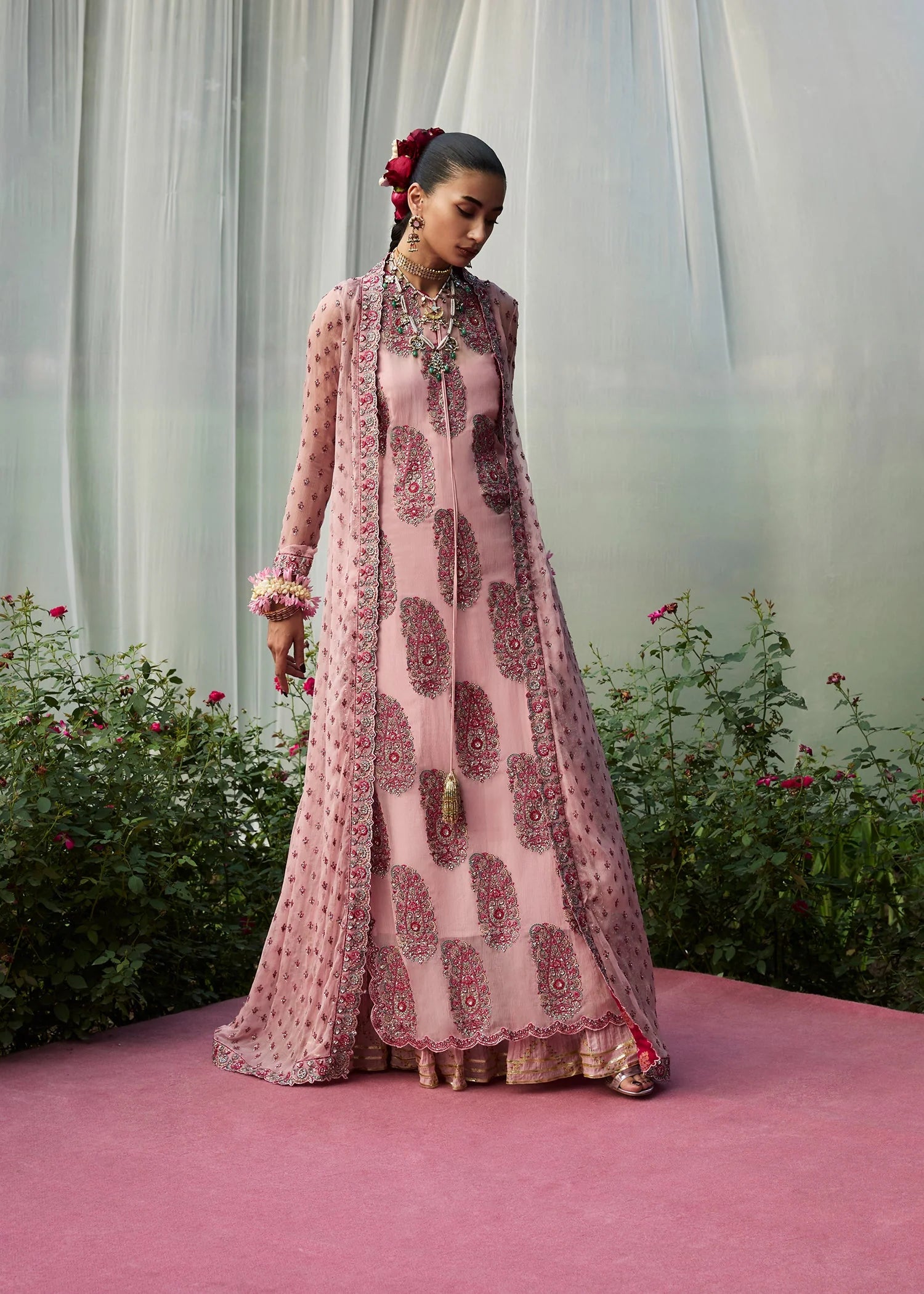 Model wearing Havena by Hussain Rehar in pastel pink embroidered ensemble – Pakistani luxury pret available for online shopping in UK.