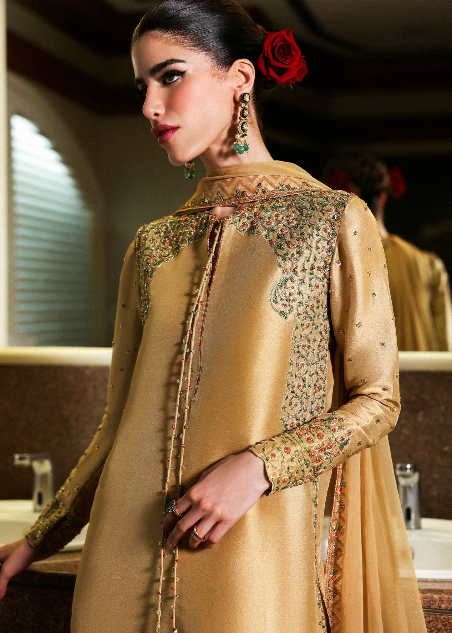 Model wearing gold Delune dress by Hussain Rehar, Pakistani luxury pret available online in UK for festive and wedding wear
