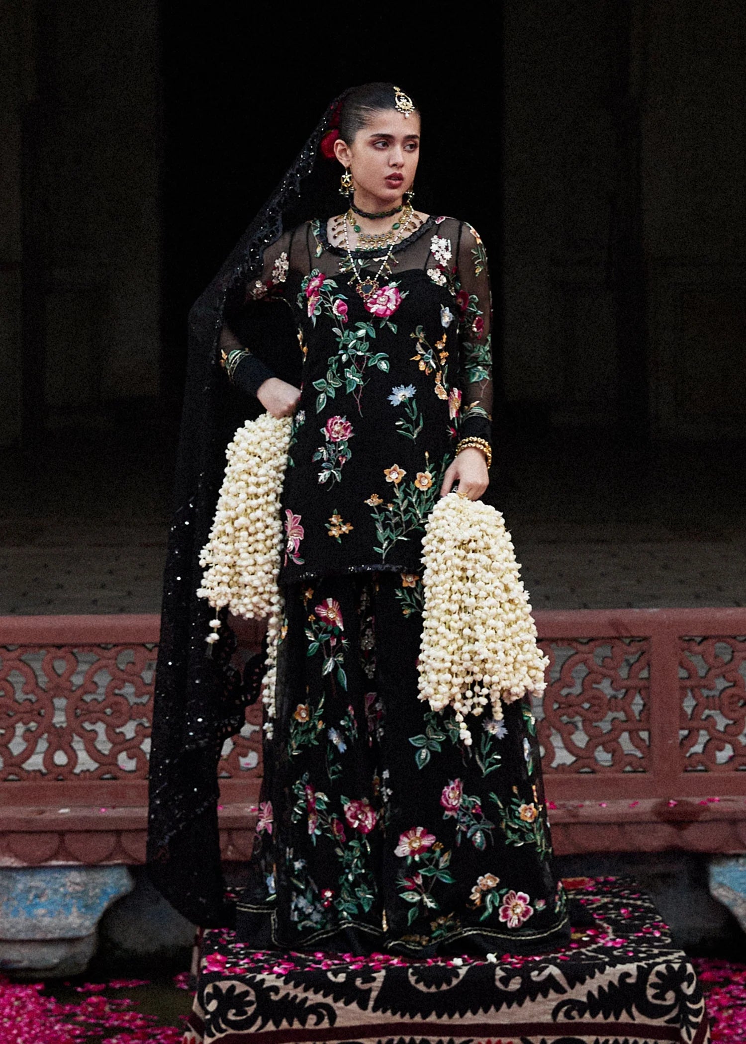 Model wearing Deraya by Hussain Rehar in black floral embroidered outfit – Pakistani luxury pret ideal for festive wear, shop online in UK.