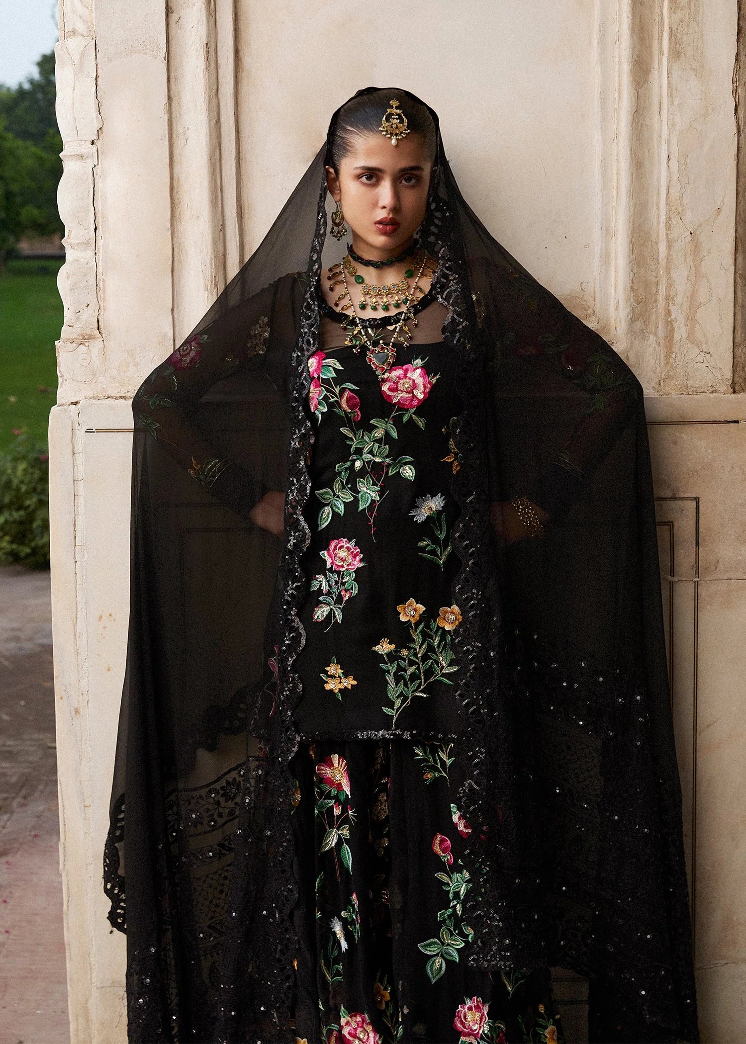 Model wearing Deraya by Hussain Rehar in black floral embroidered outfit – Pakistani luxury pret ideal for festive wear, shop online in UK.