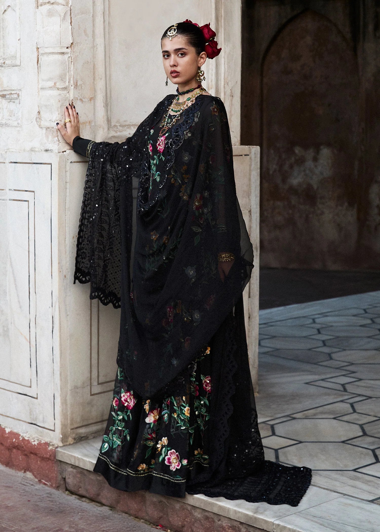 Model wearing Deraya by Hussain Rehar in black floral embroidered outfit – Pakistani luxury pret ideal for festive wear, shop online in UK.