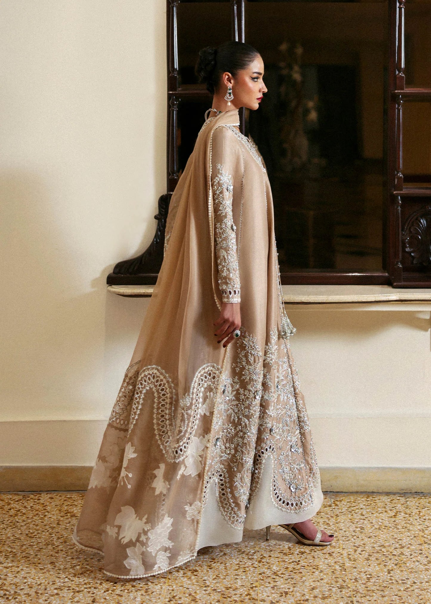 Model wearing beige Aeris dress by Hussain Rehar, Pakistani luxury pret available online in UK, ideal for festive wear