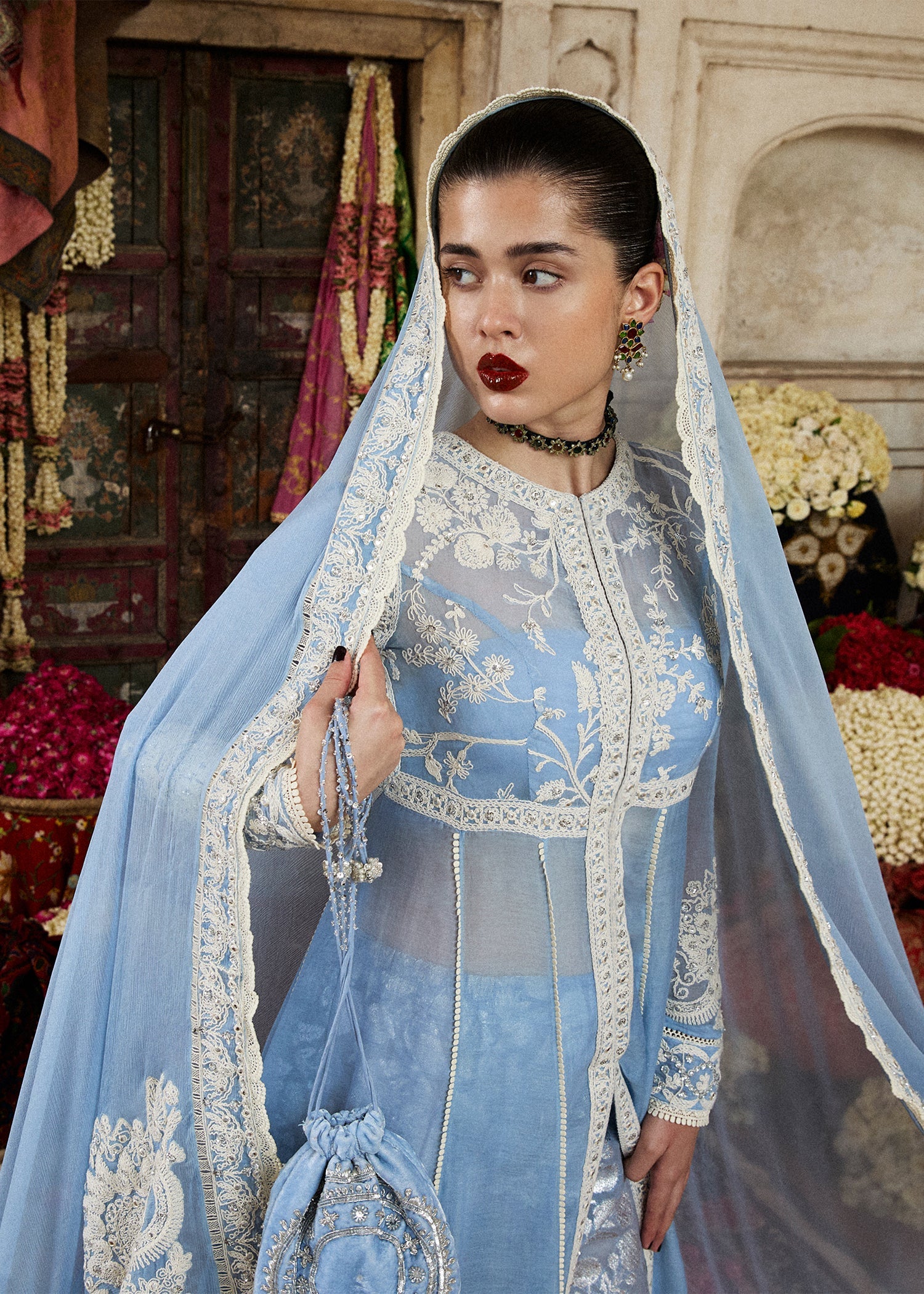 Model wearing Mehrabeen by Hussain Rehar in powder blue embroidered ensemble – Pakistani luxury pret available online in UK for festive wear.