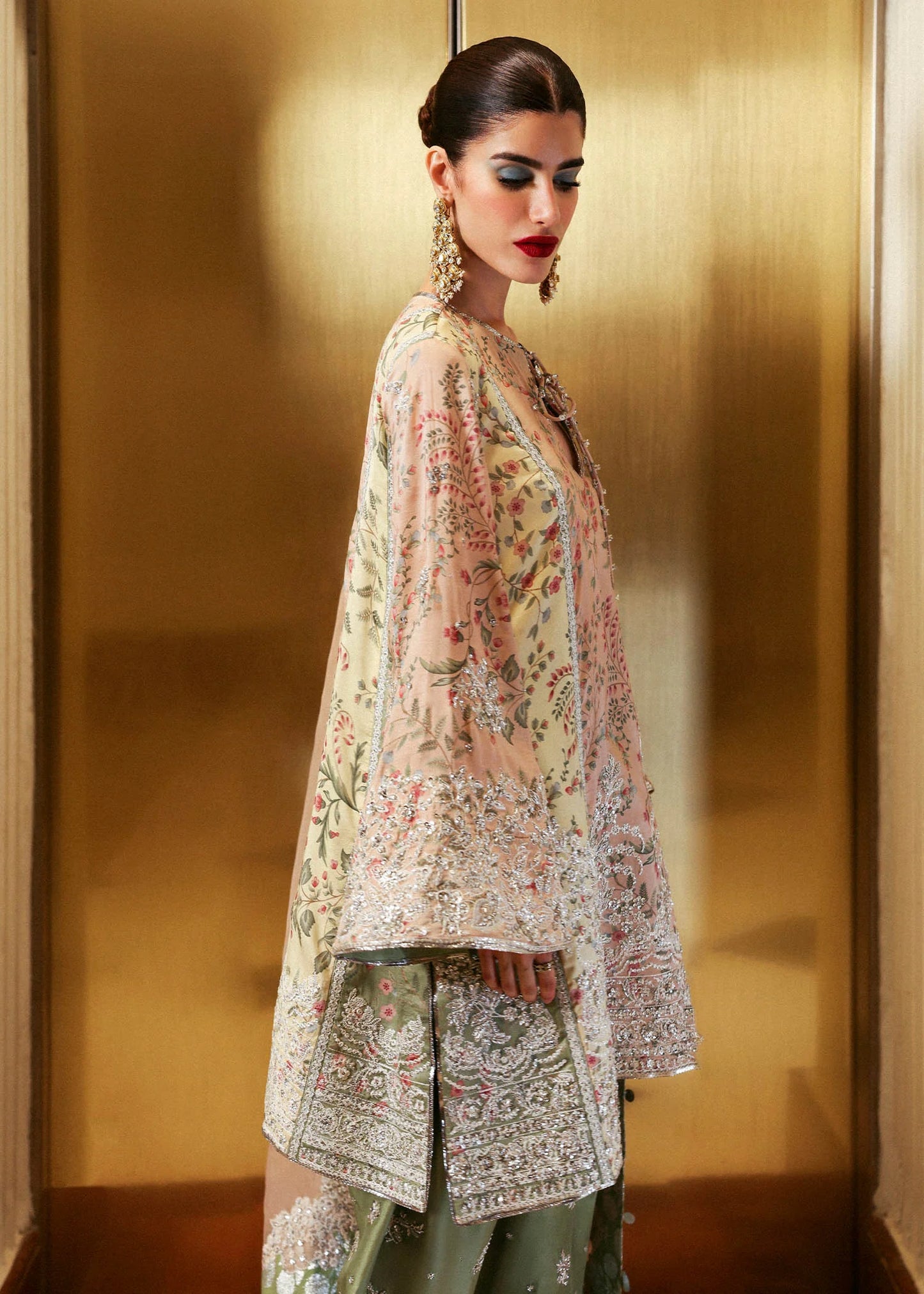 Model wearing multi-color Reve dress by Hussain Rehar, Pakistani luxury pret available online in UK for celebrations.