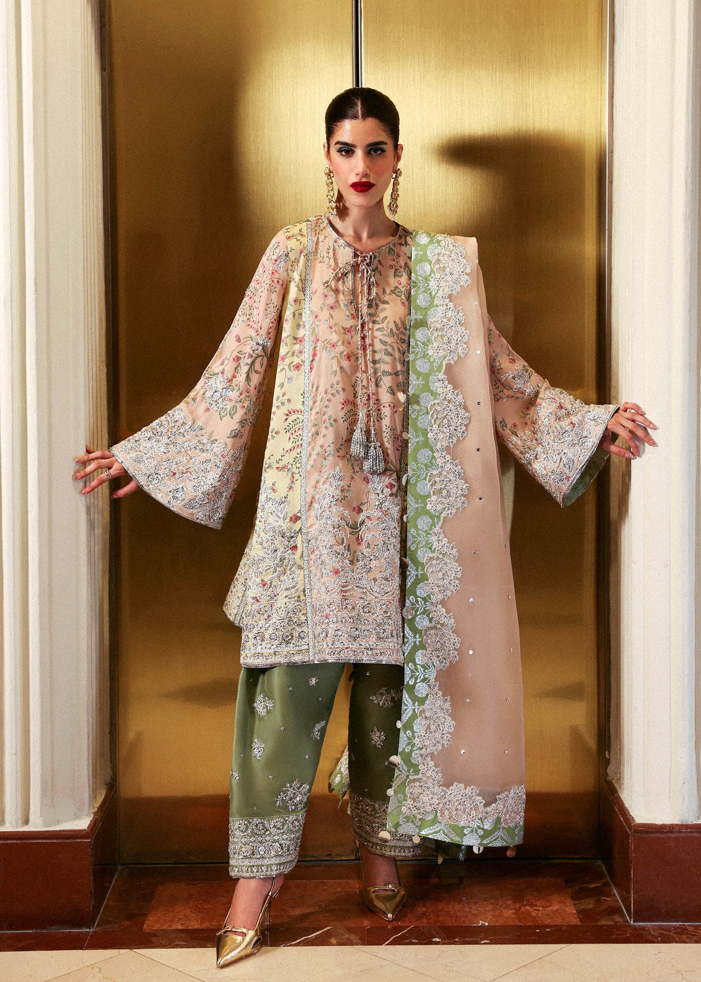 Model wearing multi-color Reve dress by Hussain Rehar, Pakistani luxury pret available online in UK for celebrations.