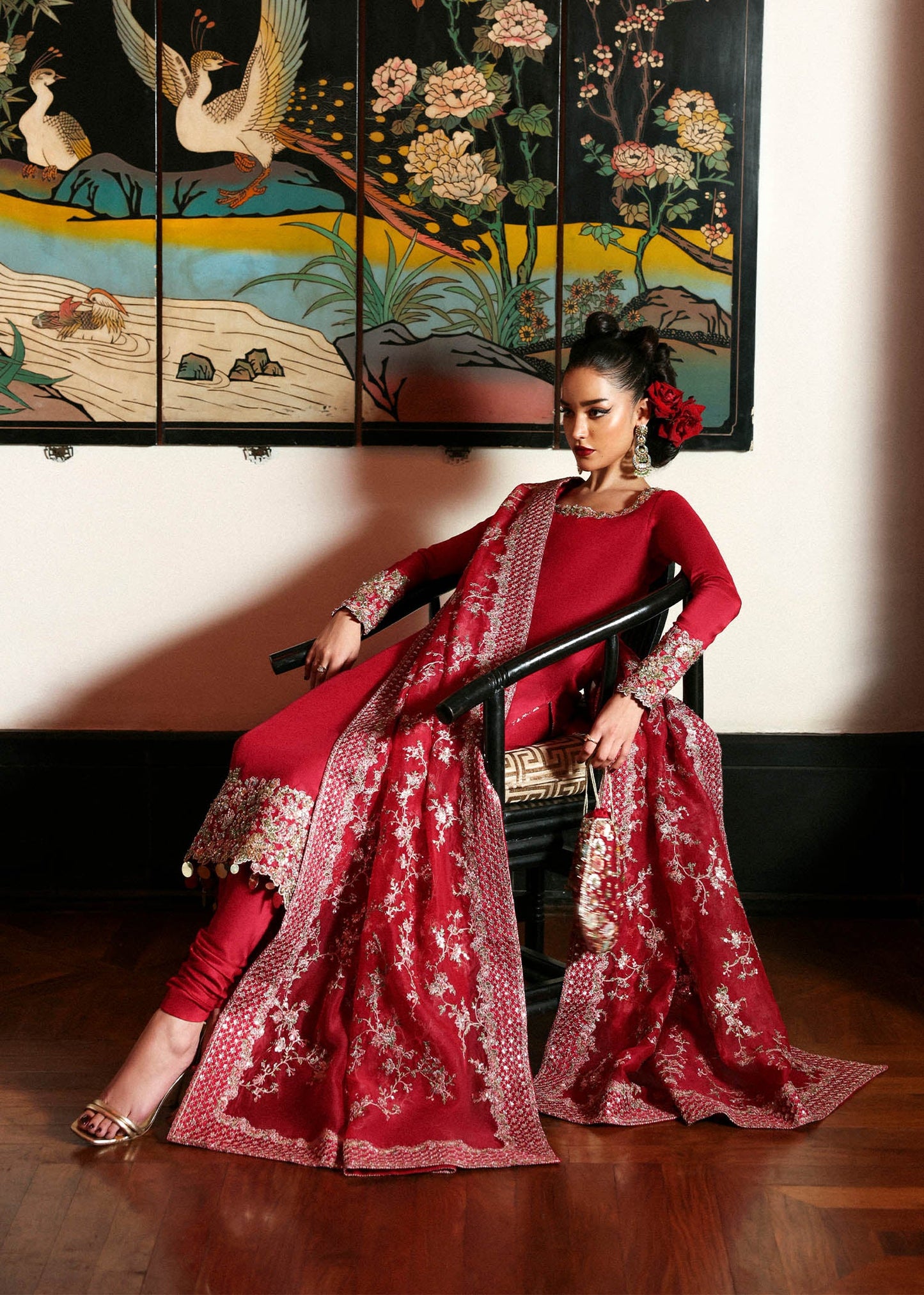 Model wearing deep red Zephira dress by Hussain Rehar, Pakistani luxury pret available online in UK for festive occasions