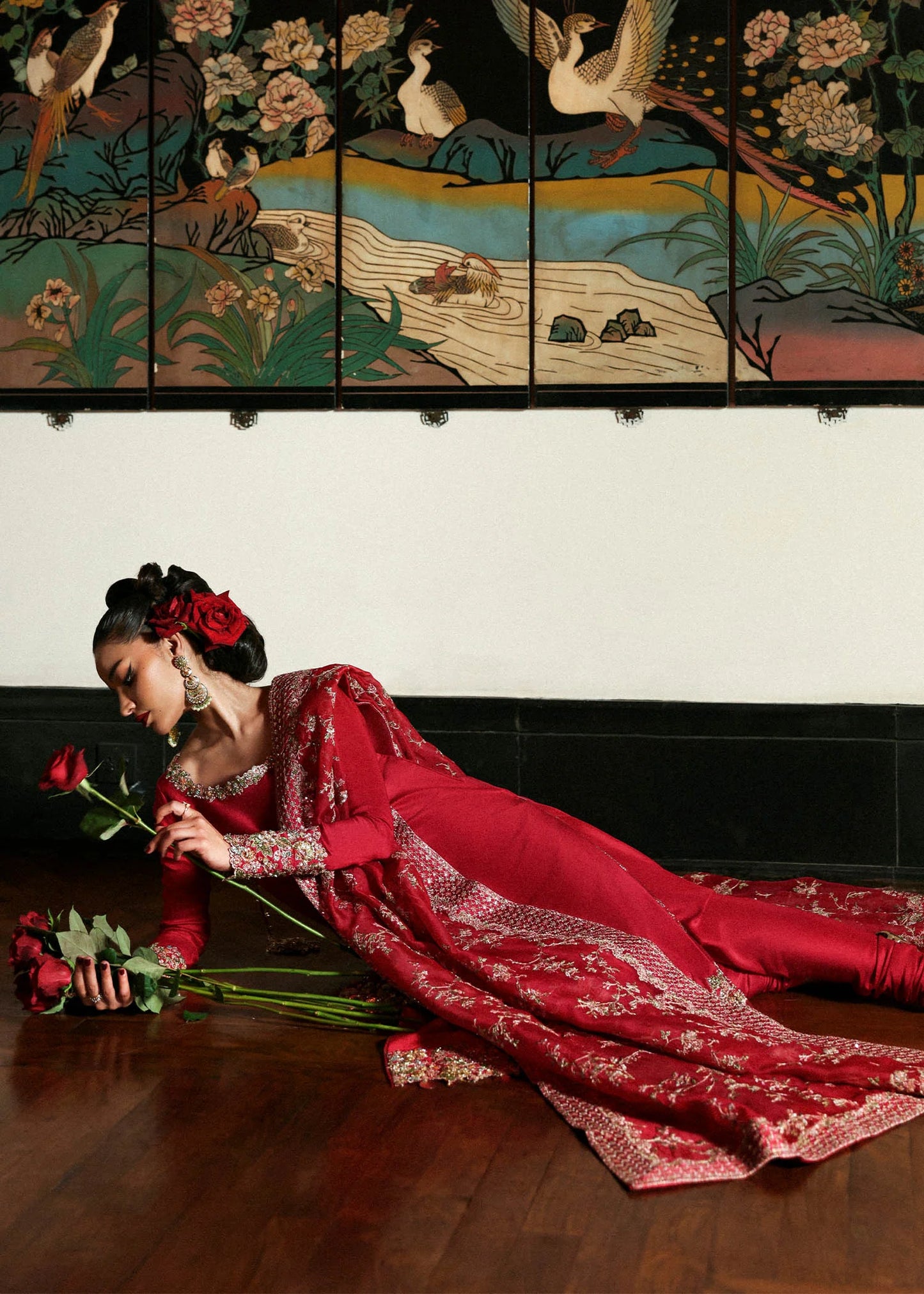 Model wearing deep red Zephira dress by Hussain Rehar, Pakistani luxury pret available online in UK for festive occasions