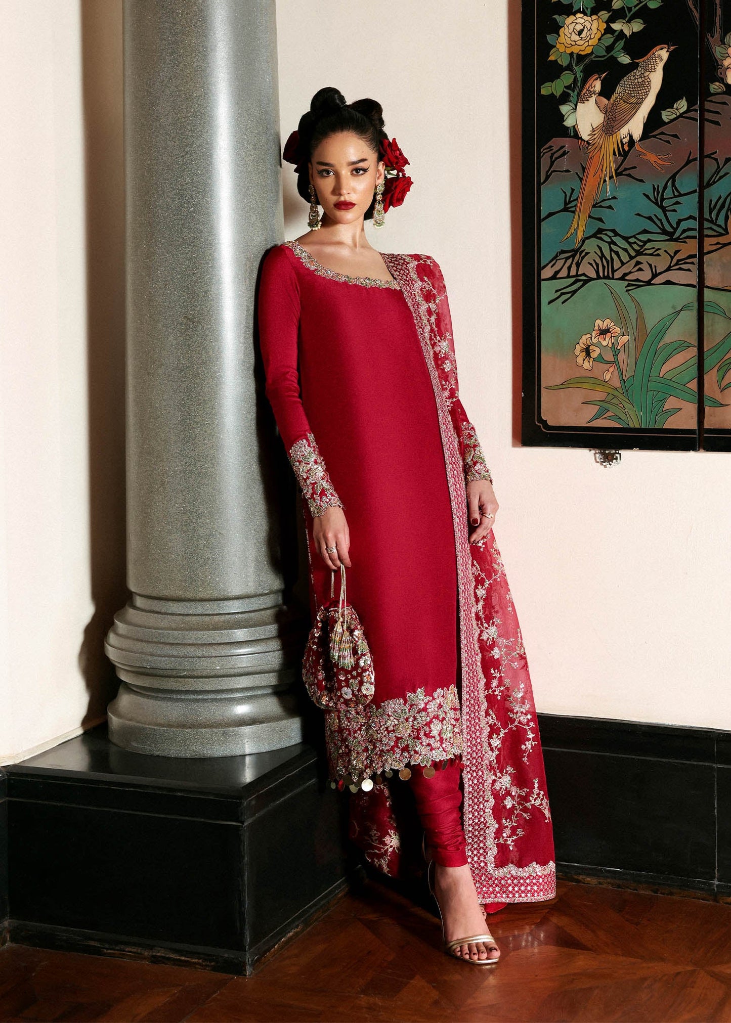 Model wearing deep red Zephira dress by Hussain Rehar, Pakistani luxury pret available online in UK for festive occasions